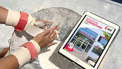 Die Badische Turnzeitung liegt als E-Magazin auf einem Magnesiaspender in der Turnhalle.