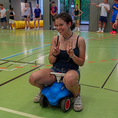Symbolbild Teilnehmerin auf einem Bobbycar bei Surprise im Camp Breisach 2026